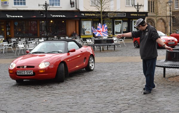 Keith waving cars away in Abingdon Town Square