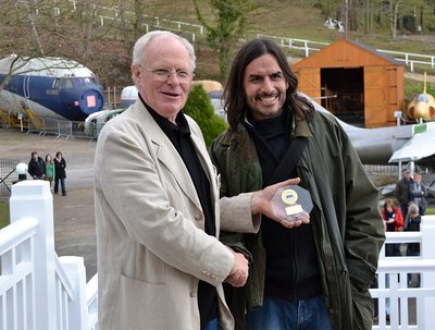 Damien receives the TF of the day trophy from Allan Winn