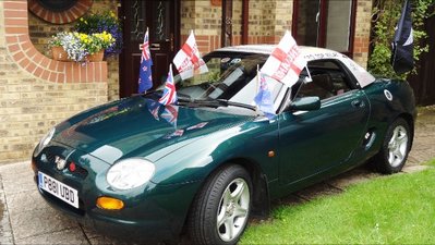 At home with the hard top and flags of Dave &amp; Carole's native New Zealand and the UK