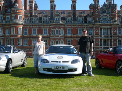 Liz and Keith and their LE500 in front of Royal Holloway College
