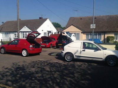 Dan's red van, James' white one.<br />Our red TF and Ken's VVC