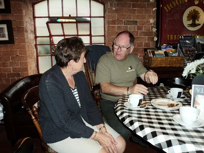 Tea at Hook Norton Brewery while John's MGF tries to get in through the window to join in.