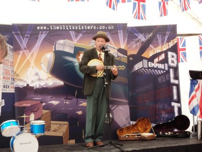George Formby - and this chap not only sounded like him but looked like him too - great fun to watch!!